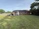 Spacious backyard with outdoor seating, grill, and ample green space at 1139 Belvedere Dr, Hanahan, SC 29410