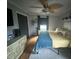 Bright bedroom with a ceiling fan, and hardwood floors, decorated with personal touches at 1139 Belvedere Dr, Hanahan, SC 29410