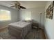 Bedroom with a large window, comfortable bed, and a soft rug at 1139 Belvedere Dr, Hanahan, SC 29410