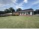 Charming single story home with a lush lawn and inviting front porch, perfect for enjoying the outdoors at 1139 Belvedere Dr, Hanahan, SC 29410