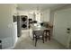 Bright kitchen featuring modern appliances, a breakfast bar, and ample cabinet space for all your culinary needs at 1139 Belvedere Dr, Hanahan, SC 29410