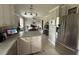 Well-lit kitchen with stainless steel appliances and island, providing a modern and functional cooking space at 1139 Belvedere Dr, Hanahan, SC 29410