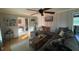 Light-filled living room with decorative accents and a large sectional sofa, perfect for relaxing and entertaining at 1139 Belvedere Dr, Hanahan, SC 29410