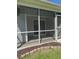 The screened porch with concrete floor and multiple openings provides a space for entertaining or relaxing at 120 Townsend Way, Summerville, SC 29483