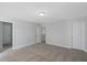 Bright and airy bedroom features neutral carpet, ample closet space, and natural light at 124 Cantona Dr, Summerville, SC 29483