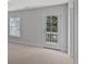 Spacious bedroom with large window and a door leading to the outside at 124 Cantona Dr, Summerville, SC 29483