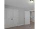 Bedroom with carpet and neutral paint featuring double doors, lighting fixture at 124 Cantona Dr, Summerville, SC 29483