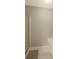 A clean, partially-shot of a bathroom with a stand up shower, white tile floors and light grey walls at 136 Blue Jasmine Ln, Summerville, SC 29483