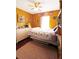 Bedroom with natural light, complete with dresser, ceiling fan and bed at 136 Blue Jasmine Ln, Summerville, SC 29483