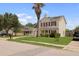A charming two-story home with a well-maintained lawn, vinyl siding, and a driveway leading to the garage at 136 Blue Jasmine Ln, Summerville, SC 29483
