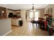 Eat-in kitchen featuring white cabinets, stainless appliances, and space for dining at 136 Blue Jasmine Ln, Summerville, SC 29483