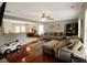 Spacious living room with hardwood floors, comfortable furnishings, and an open layout at 136 Blue Jasmine Ln, Summerville, SC 29483