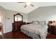 Main bedroom features hardwood floors, ceiling fan and ample storage space at 136 Blue Jasmine Ln, Summerville, SC 29483