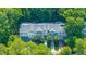 Overhead view of townhomes in wooded community setting with lush landscaping at 136 Fair Sailing Rd, Mount Pleasant, SC 29466