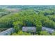 Aerial view showcasing the community's lush greenery and serene lakeside setting at 136 Fair Sailing Rd, Mount Pleasant, SC 29466