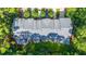 Stunning aerial view of townhomes surrounded by lush trees and manicured lawns at 136 Fair Sailing Rd, Mount Pleasant, SC 29466
