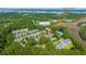 Serene aerial of the community near a beautiful lake, highlighting 136 Fair Sailing Rd at 136 Fair Sailing Rd, Mount Pleasant, SC 29466