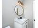 Bathroom featuring a single vanity with granite countertop and updated lighting at 136 Fair Sailing Rd, Mount Pleasant, SC 29466