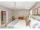 Spacious bedroom with neutral walls, chandelier, and shutters at 136 Fair Sailing Rd, Mount Pleasant, SC 29466