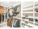 Organized walk-in closet with shelving, hanging racks, and ample storage space at 136 Fair Sailing Rd, Mount Pleasant, SC 29466