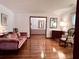 Elegant living room with hardwood floors, traditional trim, and ample space for entertaining guests at 14 Ashland Dr, Charleston, SC 29407