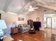 Bright living area with vaulted ceiling, ceiling fan and hardwood floors, perfect for entertaining at 14 Ashland Dr, Charleston, SC 29407