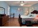 Serene main bedroom featuring hardwood floors, ample space, and calming blue walls for relaxation at 14 Ashland Dr, Charleston, SC 29407