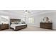 This bright and airy main bedroom features tray ceilings, large windows, and matching dressers at 147 Seaton St, Summerville, SC 29486