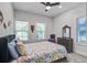 A beautifully decorated bedroom with a comfortable bed, complemented by abundant natural light at 16 Oakwood Ln, Edisto Island, SC 29438