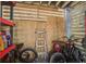 Organized garage space featuring slat walls for easy storage solutions and holding bikes at 16 Oakwood Ln, Edisto Island, SC 29438