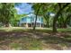 Charming coastal home on stilts, features a screen porch and beautiful natural surroundings at 16 Oakwood Ln, Edisto Island, SC 29438