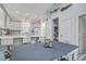 Bright kitchen with island, table, and stylish decor at 16 Oakwood Ln, Edisto Island, SC 29438