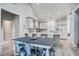 Eat-in kitchen and dining area with table and updated, bright cabinets at 16 Oakwood Ln, Edisto Island, SC 29438