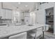 Bright kitchen features a large quartz island, modern cabinetry, and stylish backsplash at 16 Oakwood Ln, Edisto Island, SC 29438