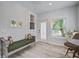 Sitting area features a loveseat with decorative pillows and table and chairs with a view to the exterior at 16 Oakwood Ln, Edisto Island, SC 29438