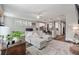 Open living room with sectional sofa flows into the kitchen with seating at 165 Village Ponds Dr, Summerville, SC 29483