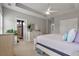 Spacious main bedroom with king bed, dresser, and ensuite bathroom at 165 Village Ponds Dr, Summerville, SC 29483