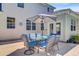 Backyard patio with outdoor table and chairs, perfect for enjoying the outdoor space at 180 Willowbend Ln, Summerville, SC 29485