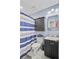 Bathroom features a toilet, vanity, medicine cabinet, and striped shower curtain at 180 Willowbend Ln, Summerville, SC 29485