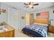 Comfortable bedroom with a bed, ceiling fan, and Route 66 decor at 180 Willowbend Ln, Summerville, SC 29485