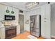 Well-lit kitchen featuring stainless steel appliances and custom white cabinets at 180 Willowbend Ln, Summerville, SC 29485