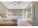 Bright main bedroom with natural light featuring windows, blinds, and a wooden dresser at 180 Willowbend Ln, Summerville, SC 29485