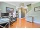 Home office with hardwood floors, modern desk, and neutral gray paint at 180 Willowbend Ln, Summerville, SC 29485