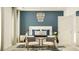 Serene main bedroom with a stylish chandelier, accent wall, and elegant furnishings at 192 Norse Bay, Summerville, SC 29486