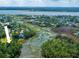 Breathtaking aerial view showcasing the homes location with amazing waterfront access and lush green surroundings at 1971 N North Creek Dr, Mount Pleasant, SC 29466