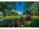 Picturesque backyard view with a black fence overlooking lush marshlands, providing a serene natural setting at 1971 N North Creek Dr, Mount Pleasant, SC 29466