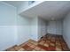 Finished basement space with tile flooring and ample storage, providing versatile usage options at 1971 N North Creek Dr, Mount Pleasant, SC 29466