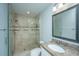 Modern bathroom featuring a tile shower, vanity with sink, and contemporary fixtures at 1971 N North Creek Dr, Mount Pleasant, SC 29466