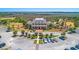 An aerial shot showcasing the Rivertowne Country Club clubhouse, with ample parking and beautifully manicured grounds at 1971 N North Creek Dr, Mount Pleasant, SC 29466