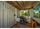 Well-equipped outdoor kitchen featuring a grill, sink, and wooden counter, perfect for entertaining at 1971 N North Creek Dr, Mount Pleasant, SC 29466